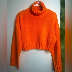 Large Orange turtle neck crop top sweater. Extremely stylish and worn once!